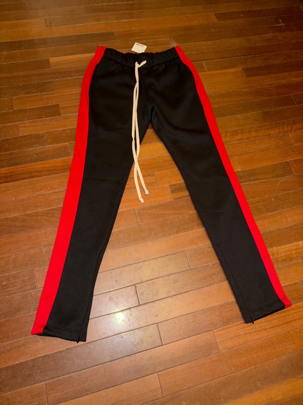 EPTM. Black Jogger Pants with Red Side Stripe